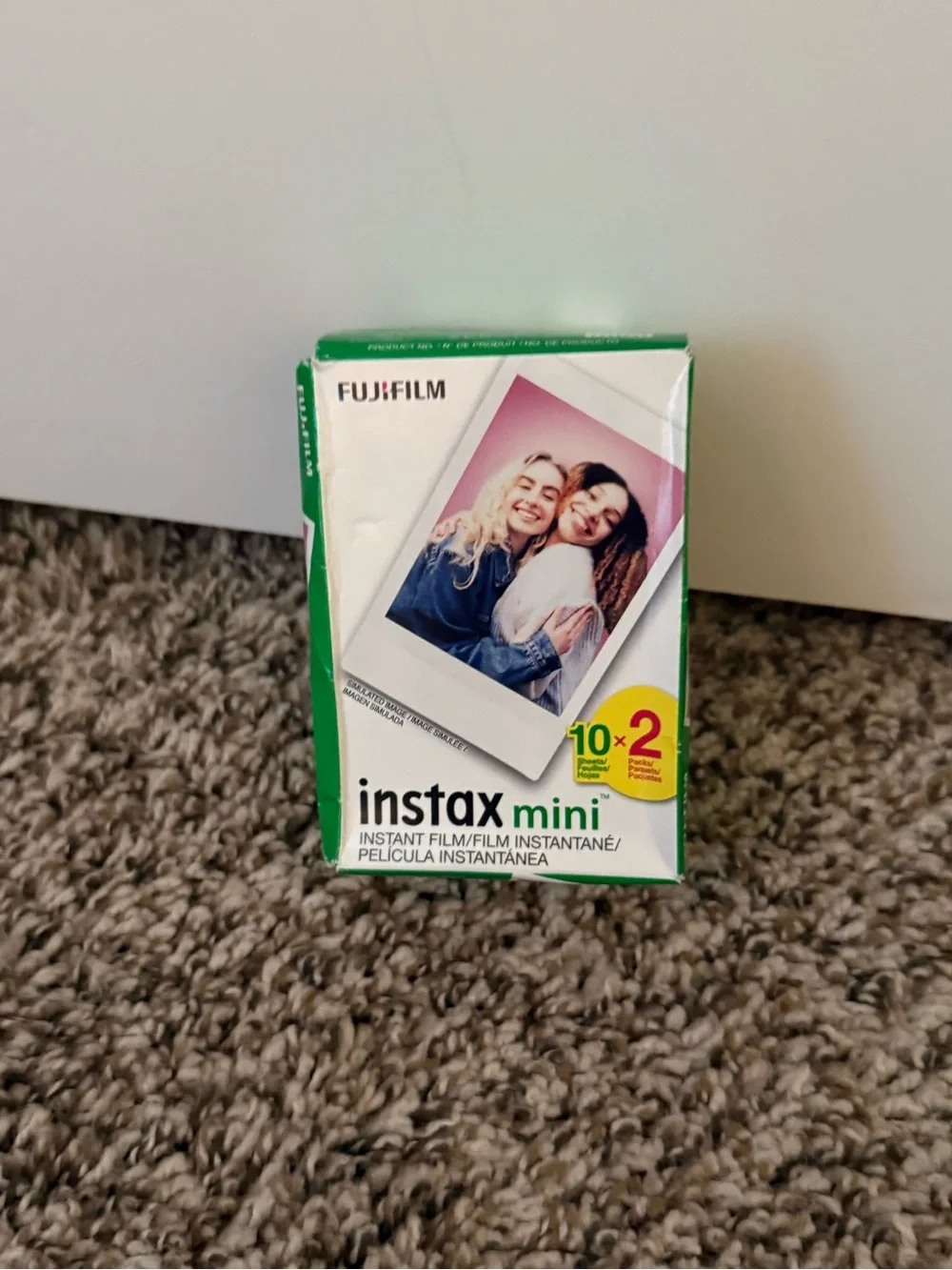 fujifilm instax mini 11 instant camera with an extra pack of film